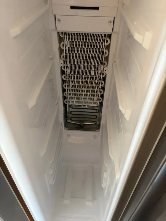 Freezer evaporator coil with the cover off, from a Tech Parker job