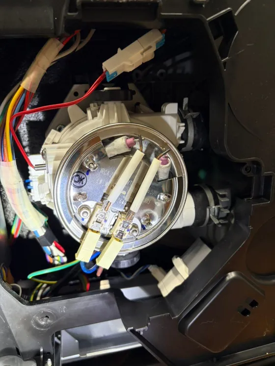 Pump and heater assembly, from underneath, from a Tech Parker job