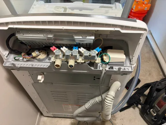 Washer console open, water inlet valves, from a Tech Parker job